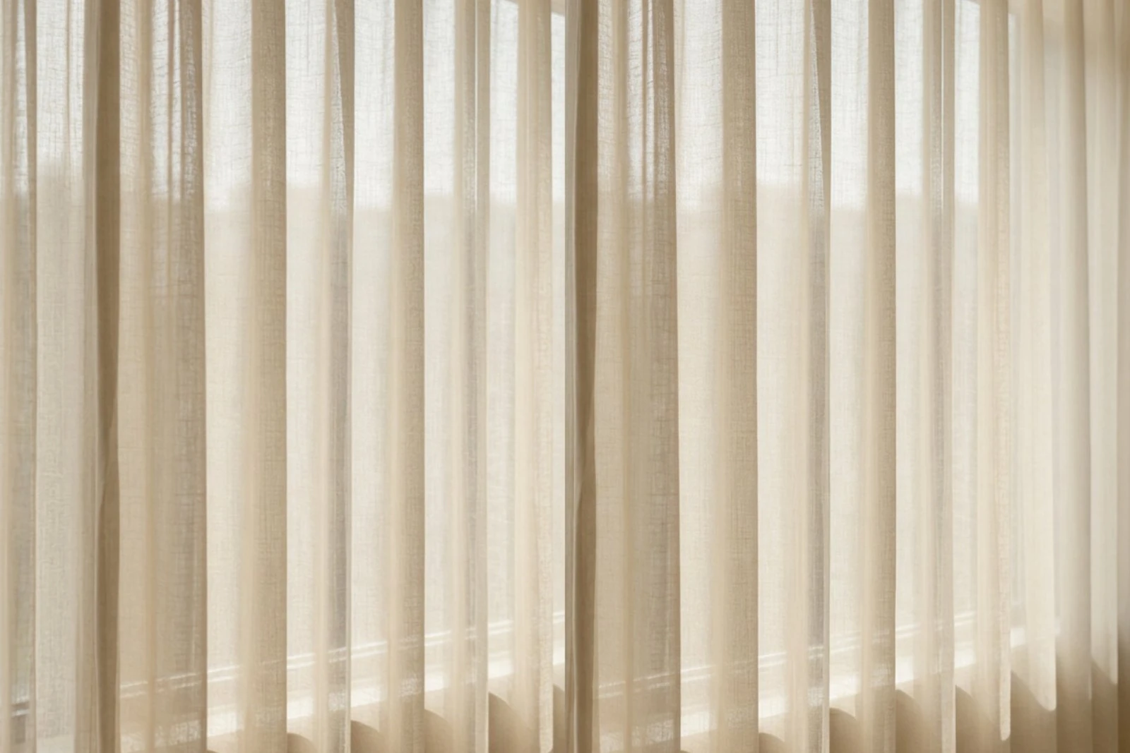 Soft daylight through sheer linen curtains at Body Dezign House cosmetic medicine clinic in Newstead, Brisbane
