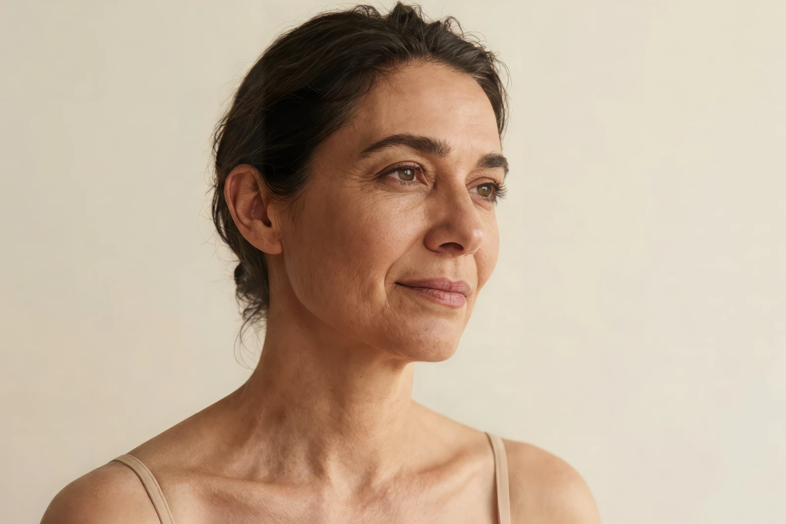 Mature woman with dehydrated skin considering a skin hydration assessment at Body Dezign House, Newstead, Brisbane